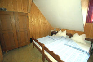 Doppelbett im Doppelbettzimmer "Arnika"