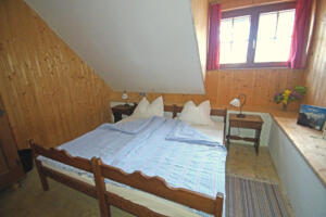 Doppelbett im Doppelbettzimmer "Arnika"
